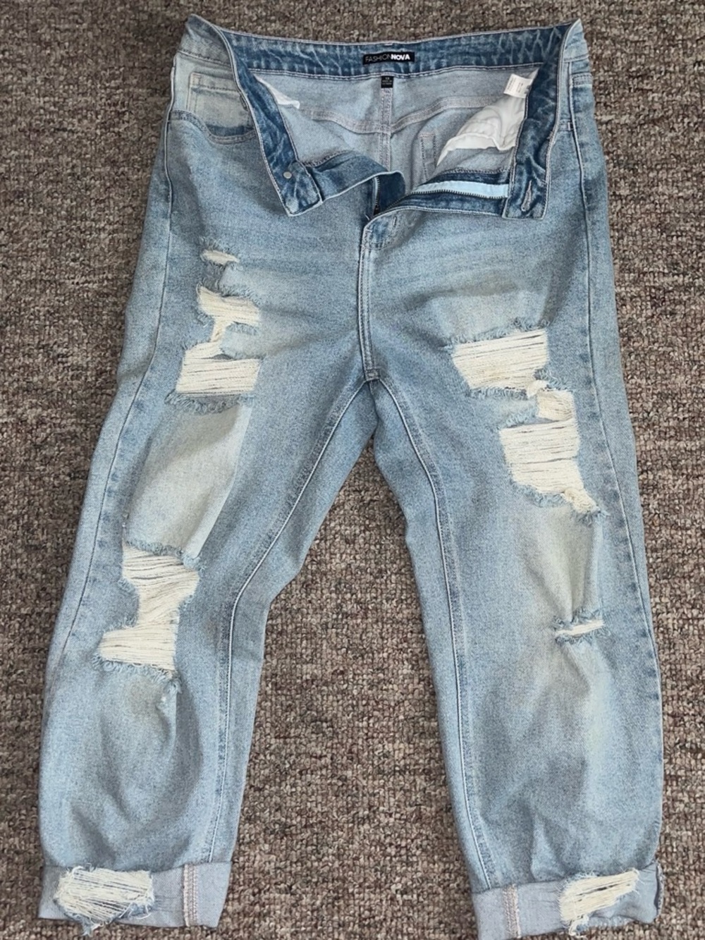Fashion Nova Wonen’s Light Blue Distressed Jeans